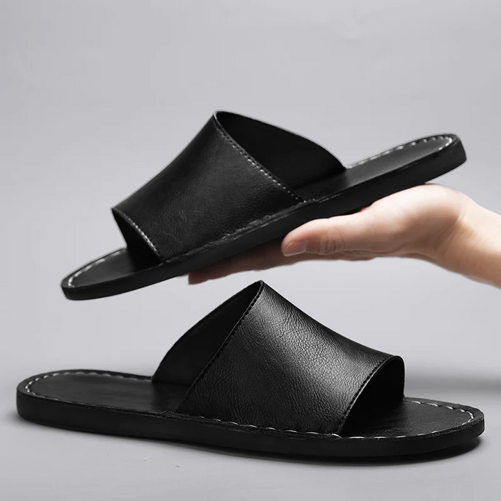 Casual men's single band slide sandals, a comfortable slip-on essential for warm weather.