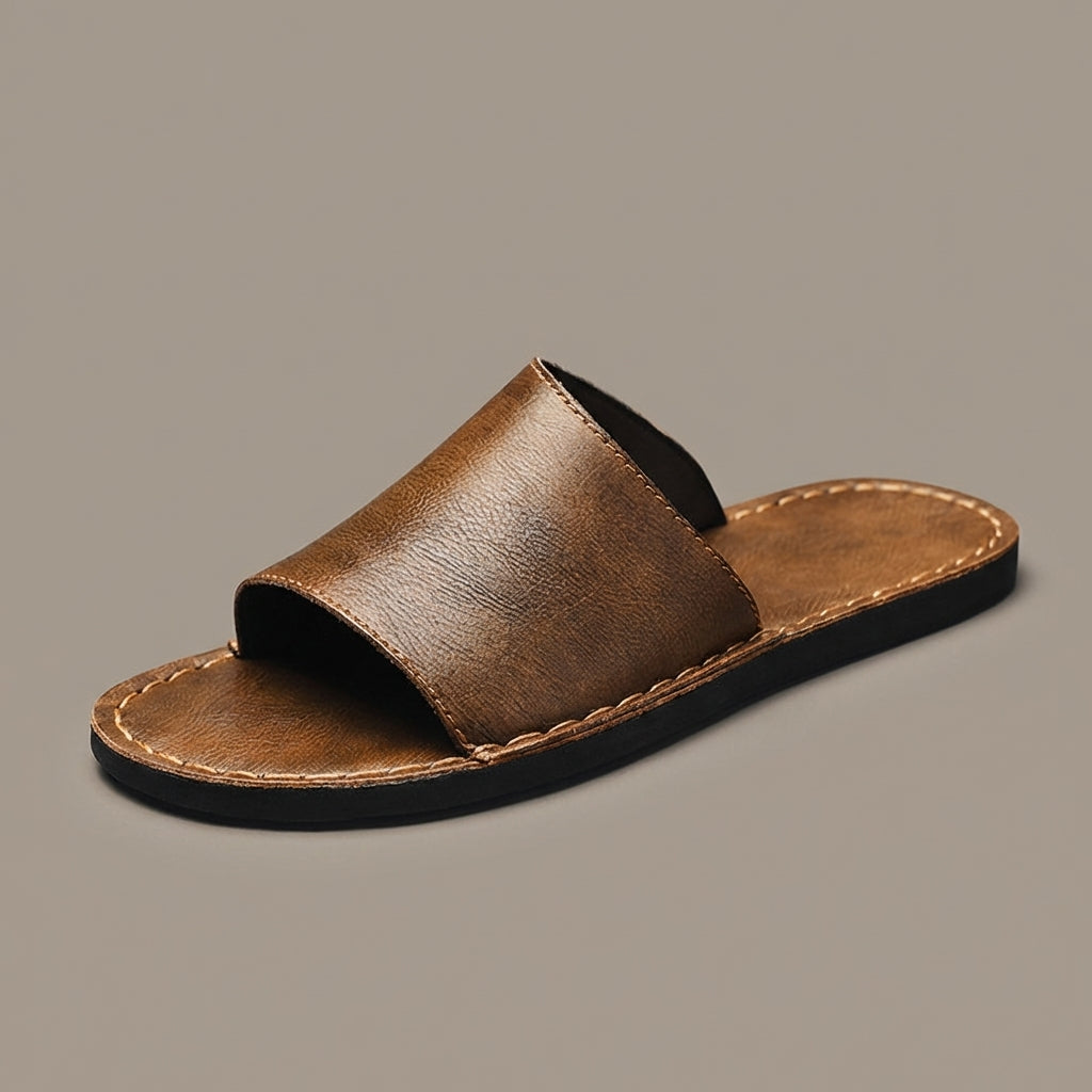 Comfortable single band slip-on men's sandals, ideal for warm weather and relaxation.