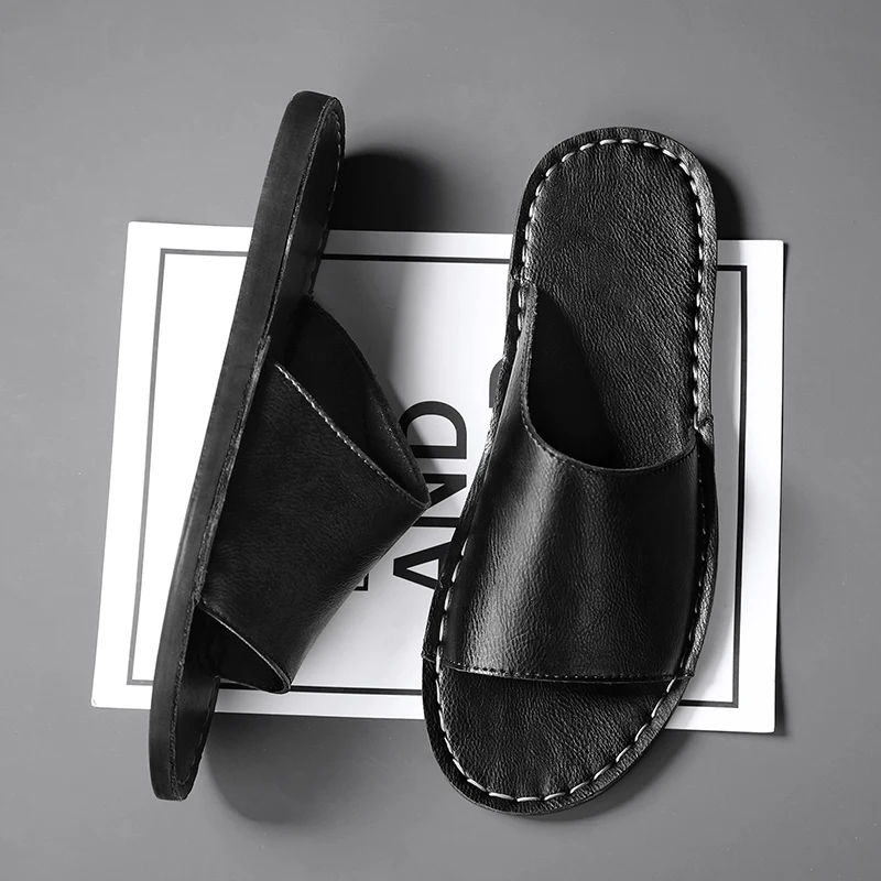 Relaxing men's slide sandals, a timeless single band design for summer comfort.