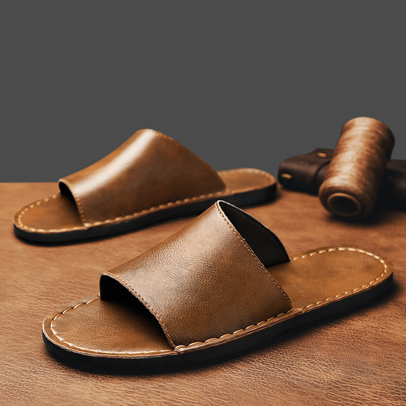 Fashionable men's slide sandals, single band for practical comfort & beach style.