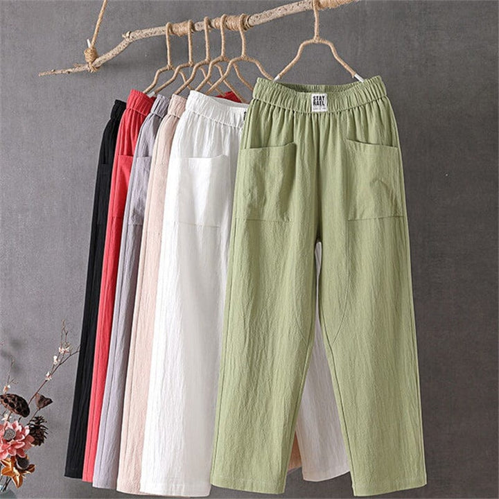 Comfortable classic fit women's linen blend trousers with elastic waist for relaxed casual style.