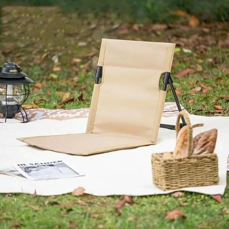 Relaxing foldable beach chair, portable outdoor seating for ultimate comfort at the beach or park.