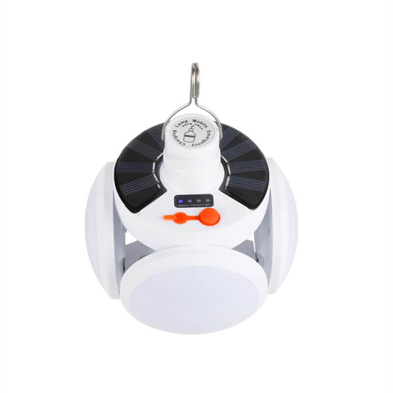 Compact foldable solar LED bulb. Portable camping lantern with USB charging for outdoor & emergency use.