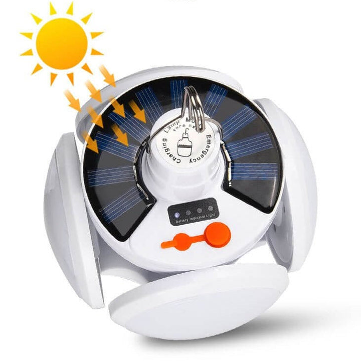 Solar LED foldable camping bulb. Bright portable light, ideal for hiking, outdoor adventures, USB rechargeable.