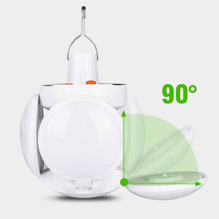 Eco-friendly foldable solar LED bulb. Rechargeable portable light for camping, outdoor, and emergency use.