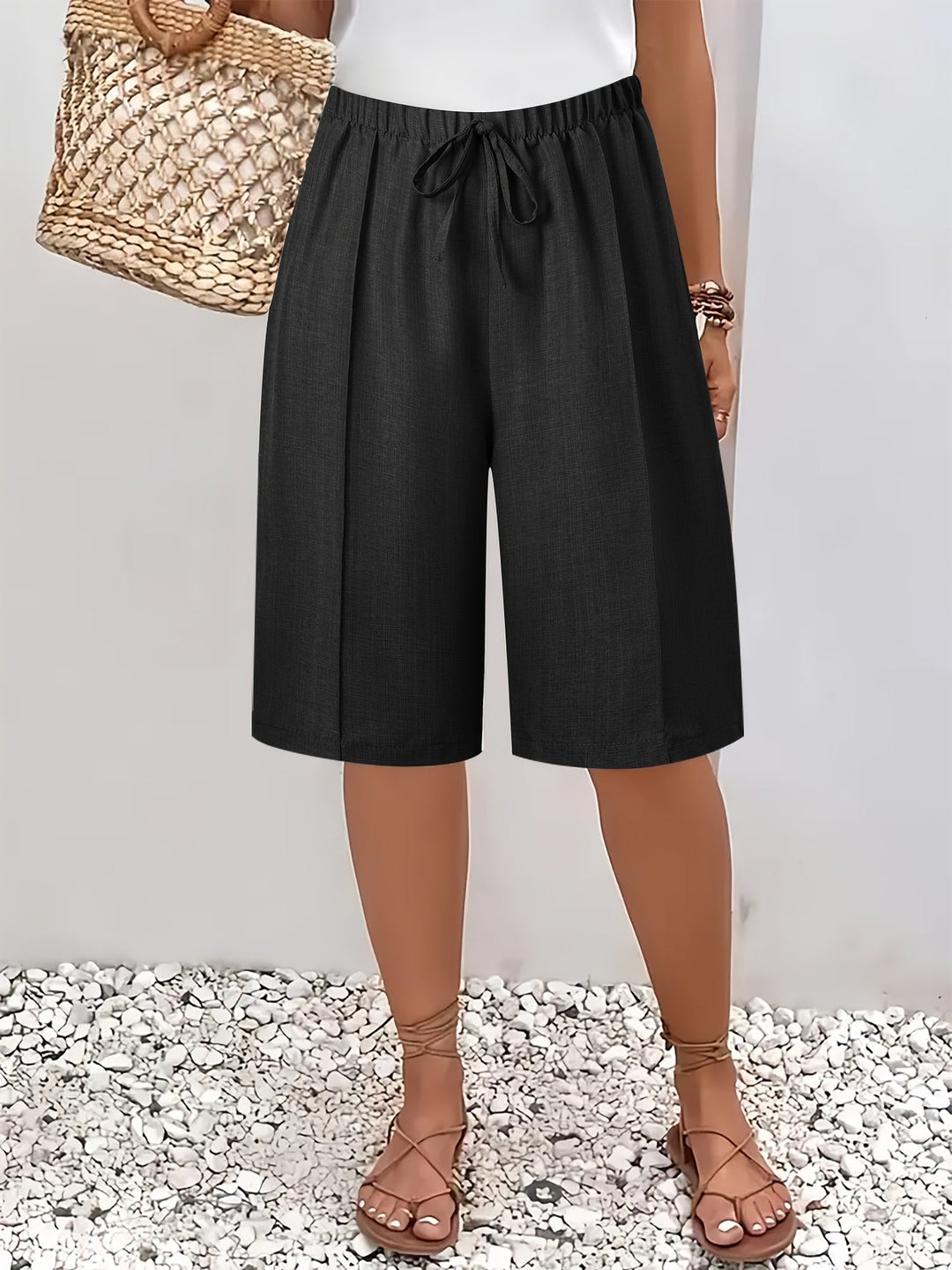 Women's classic wide leg Bermuda shorts with drawstring waist, knee-length for comfortable summer style.