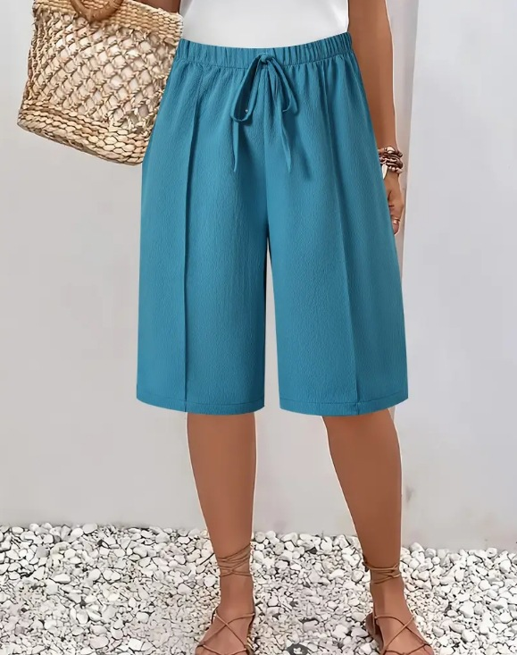 Stylish women's wide leg Bermuda shorts, drawstring waist, ideal for summer fashion & everyday casual wear.