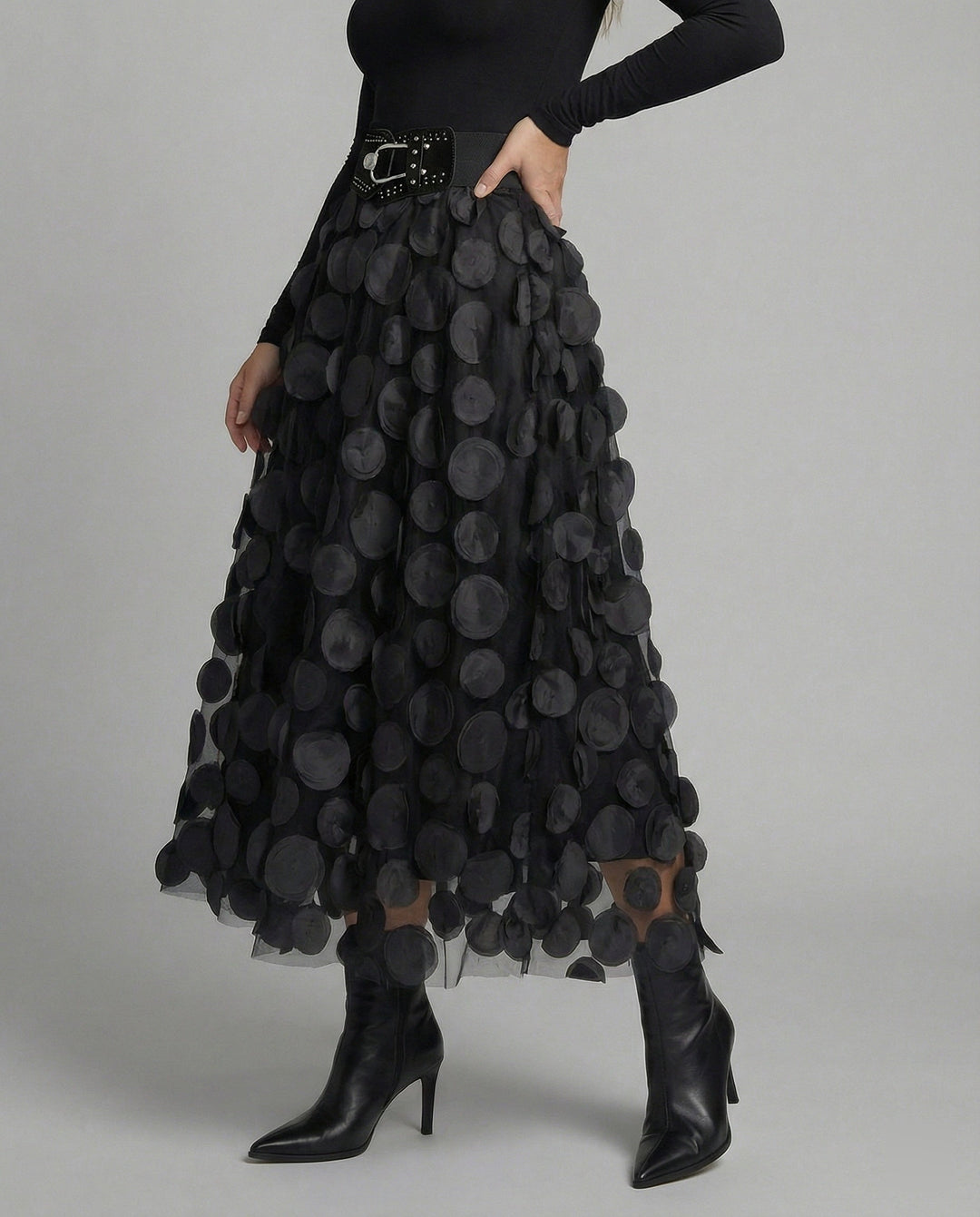 Women's effortless textured polka dot midi skirt, A-line cut.