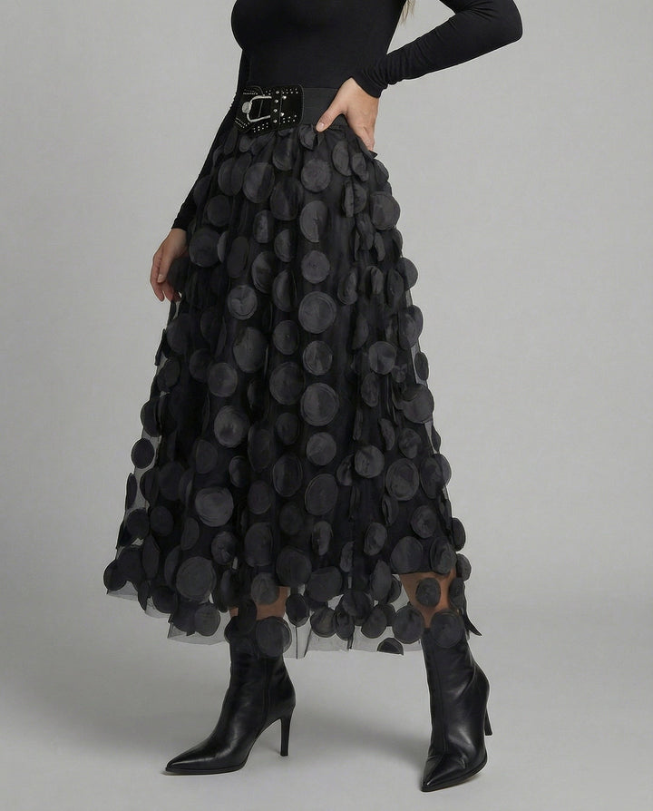 Women's effortless textured polka dot midi skirt, A-line cut.