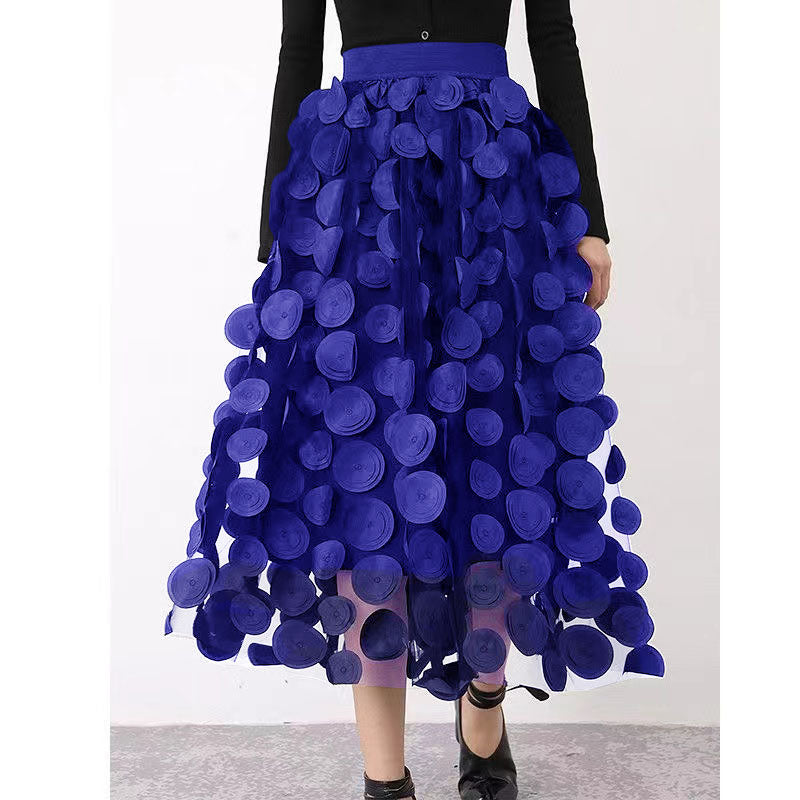 Stylish women's high-waist textured polka dot midi skirt, flowy and feminine.