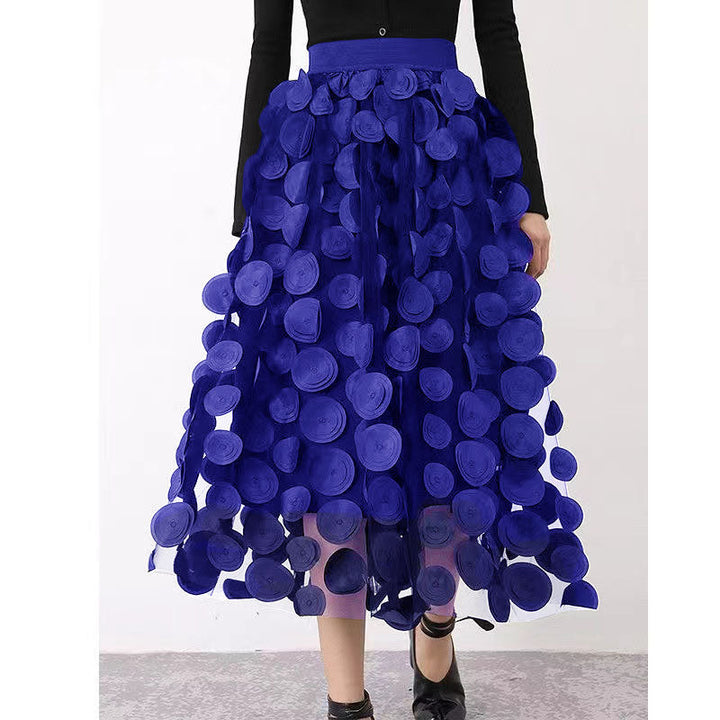 Stylish women's high-waist textured polka dot midi skirt, flowy and feminine.