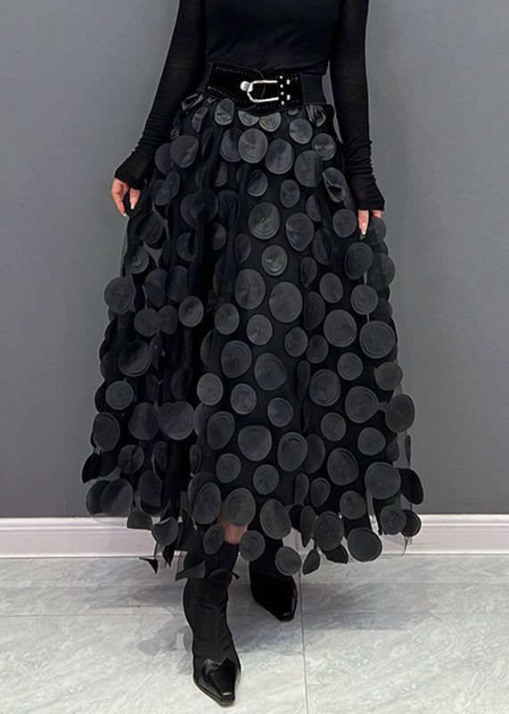 Feminine textured polka dot midi skirt, perfect for evening wear.