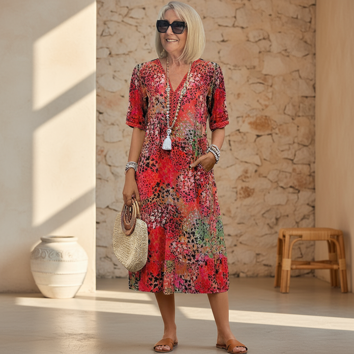 Elegant vibrant flowing women's midi dress, perfect for summer parties and special occasions.