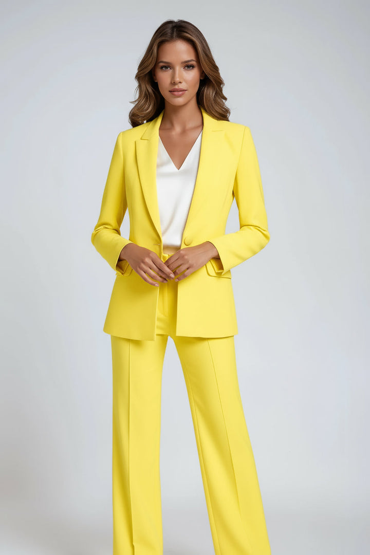 Elegant two-piece women's suit: tailored blazer and flowing wide-leg trousers for sophisticated style.