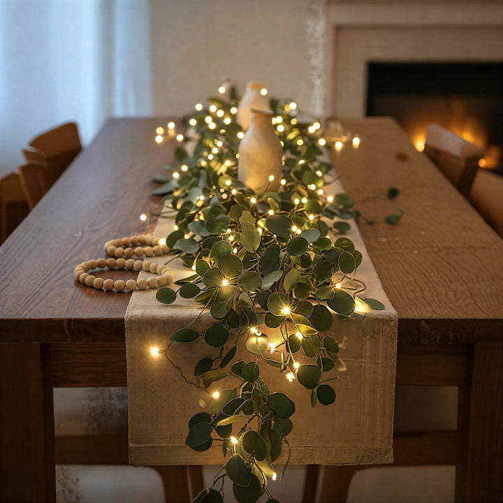 Decorative LED olive branch string lights. Cordless, battery operated, warm white glow for home ambiance.