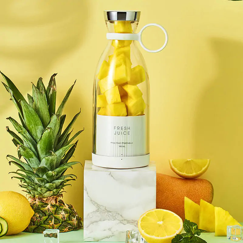 Sleek portable smoothie maker, perfect for gym or office. Enjoy homemade fruit blends.