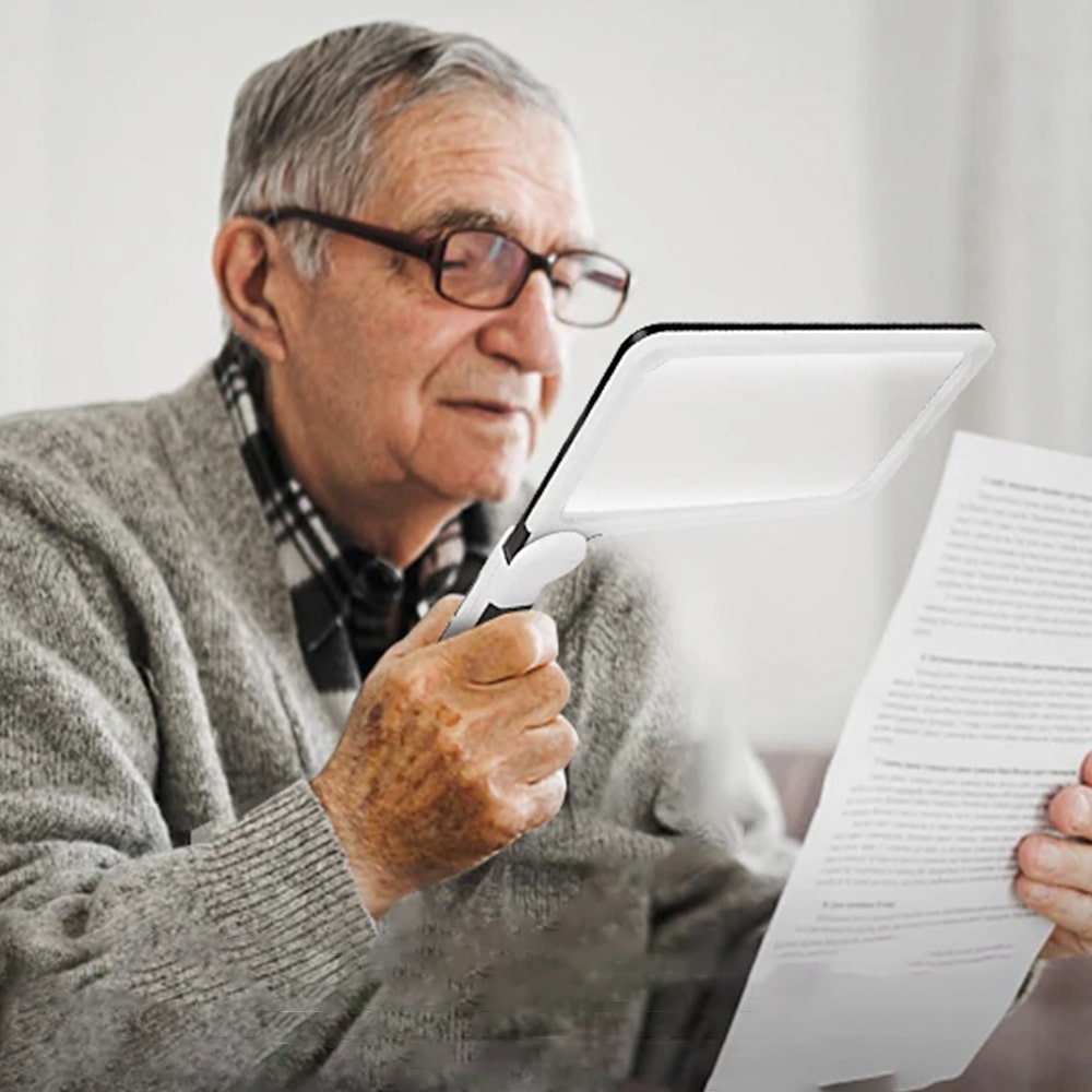 Handheld 5x magnifying glass with built-in LEDs, ideal for seniors, crafting, and low vision aids.