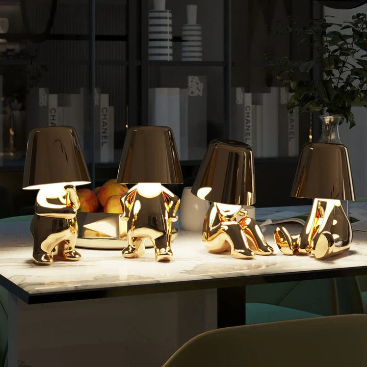 Artistic LED lamp, dimmable & portable. Resin statue design adds elegant accent lighting.