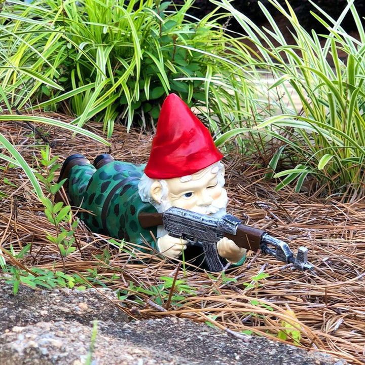 Garden gnome warrior statue, a whimsical and funny outdoor decor piece for your yard or garden.