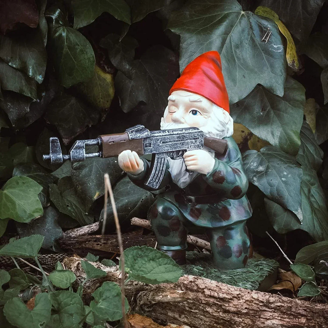 Weatherproof garden gnome warrior for outdoor decor, a durable and charming garden statue.