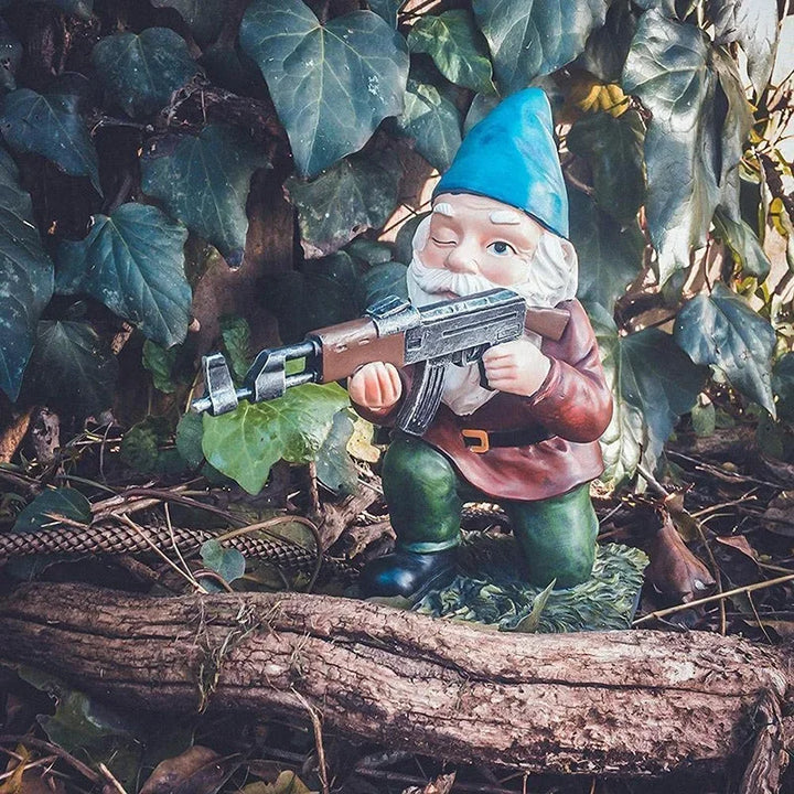 Hand-painted garden gnome warrior statue, whimsical outdoor decor for any garden or patio area.