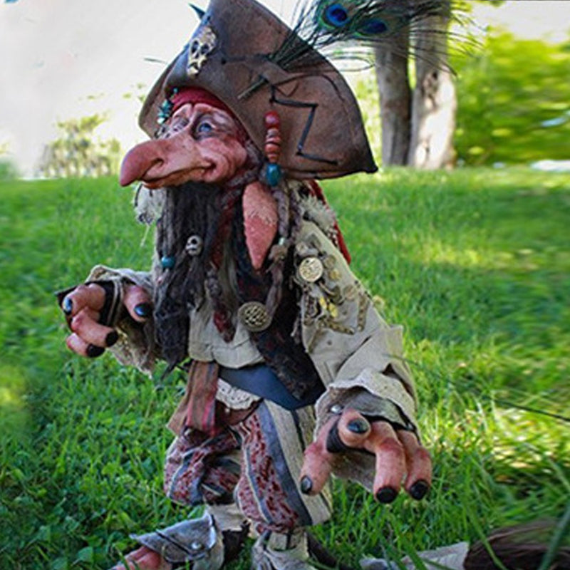 Durable outdoor garden goblin figurine, whimsical fantasy decor & yard art accessory.
