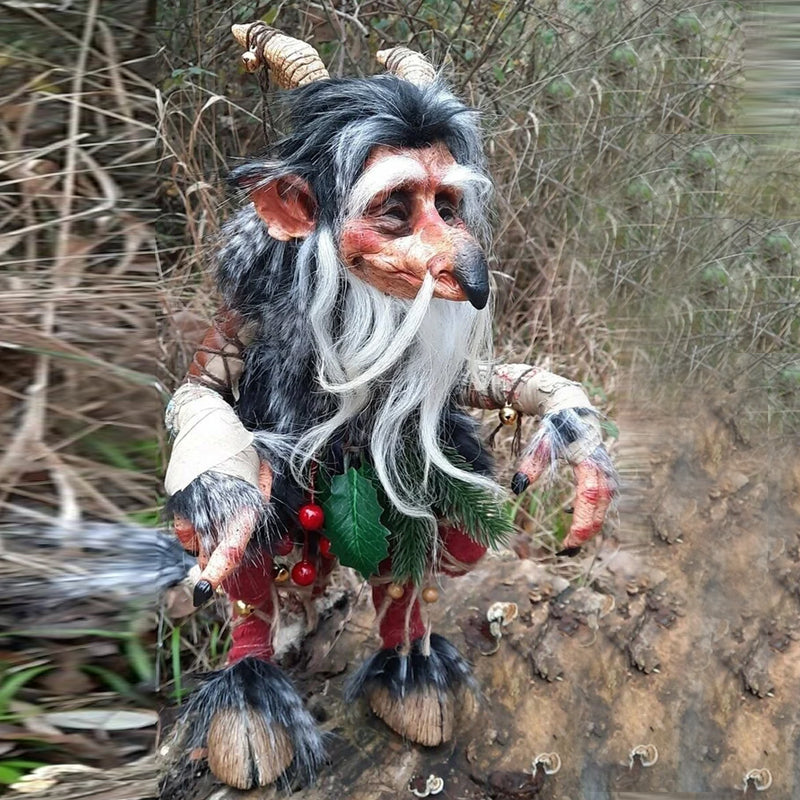 Decorative whimsical garden goblin figurine, a unique outdoor statue and fantasy yard art.
