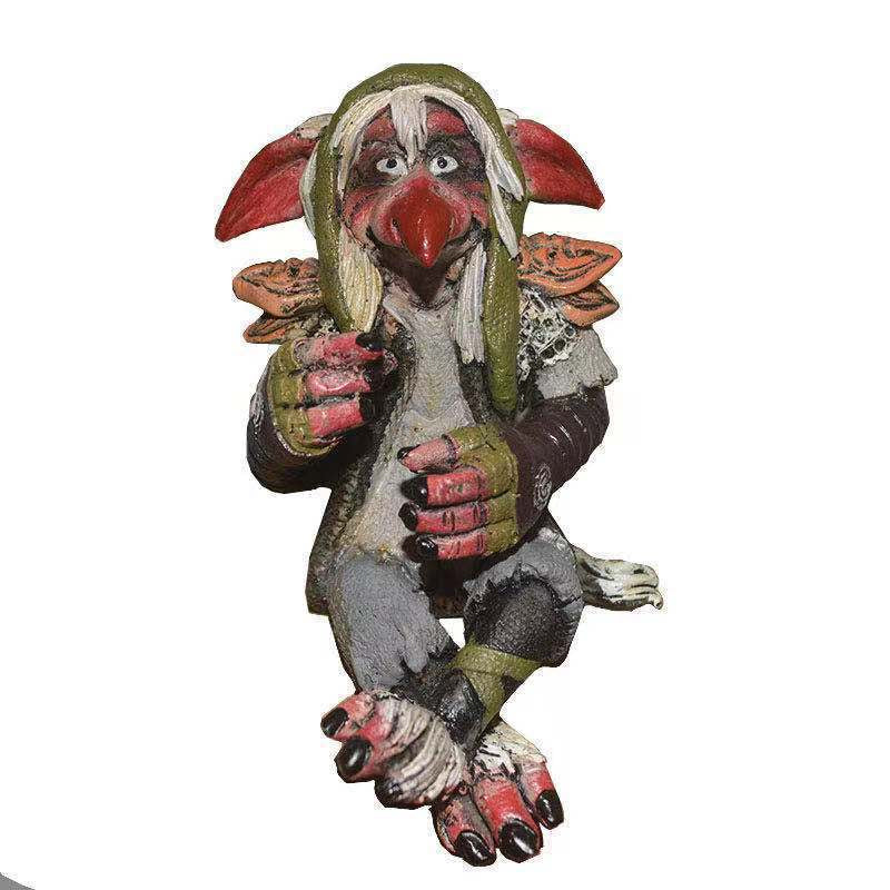 Collectible plastic whimsical garden goblin figurine, a fantasy outdoor statue & yard art decor.