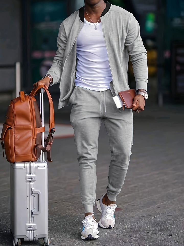 Stylish men's two-piece full zip tracksuit for sports, gym, or everyday active lifestyle.