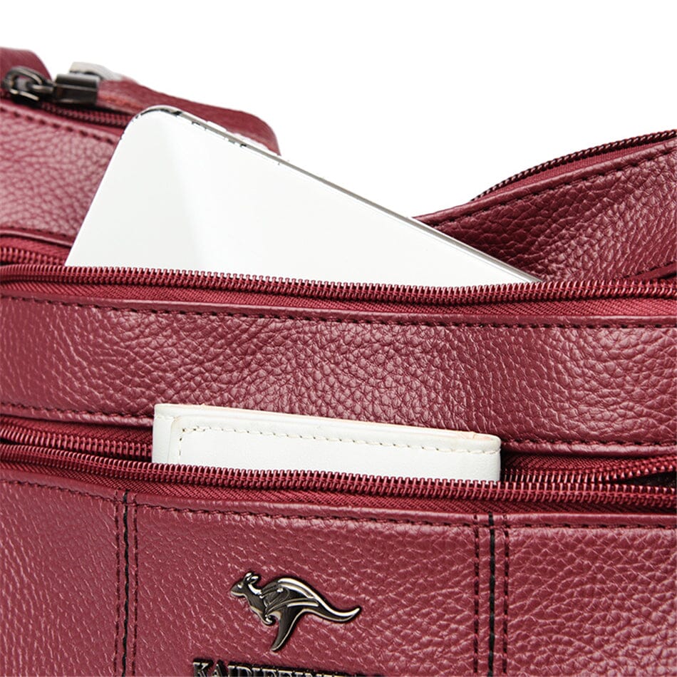 Graceful women's genuine leather handbag. Elegant luxury accessory for fashion-forward shoulder or tote use.