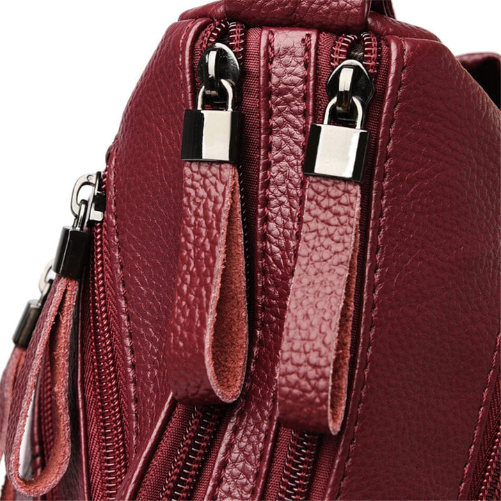 High-quality genuine leather women's elegant handbag. Luxury fashion shoulder tote bag for sophisticated style.