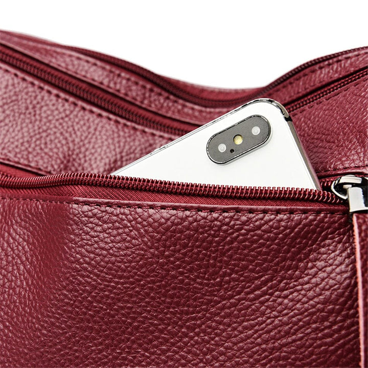Classic design genuine leather women's handbag. Elegant luxury fashion accessory, perfect as a shoulder bag.