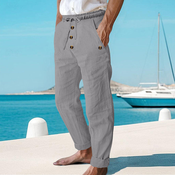 Versatile men's summer pants: relaxed fit linen cargo with adjustable drawstring for casual outings.