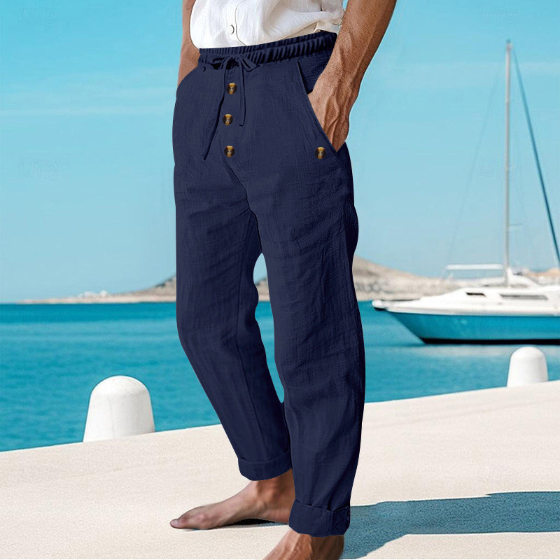 Full-length shot of men's effortless linen cargo pants, showcasing relaxed fit & everyday comfort.