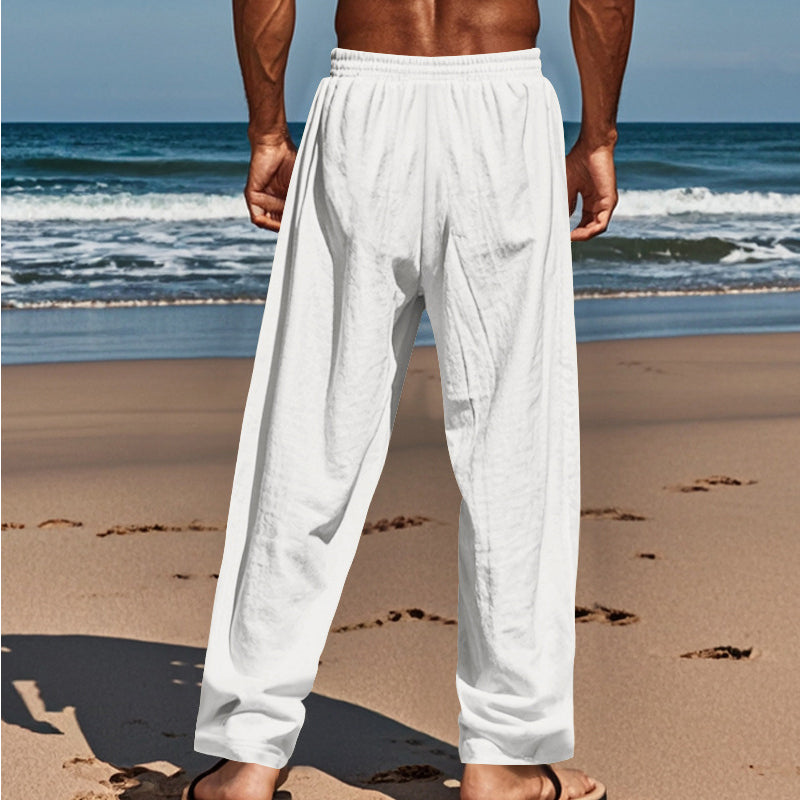 Close-up of men's linen cargo pants drawstring waist detail and soft, breathable fabric texture.