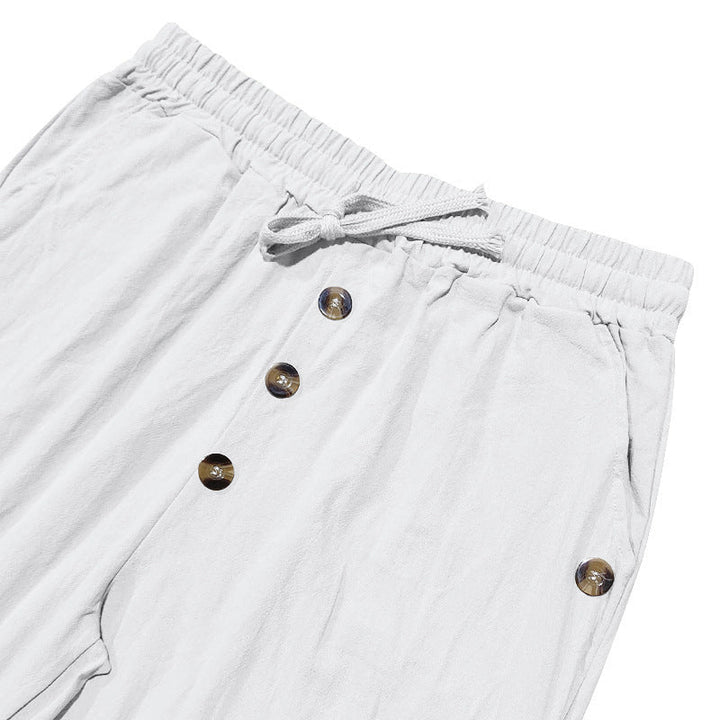 Side view of men's casual linen cargo pants, highlighting practical pockets and relaxed silhouette.