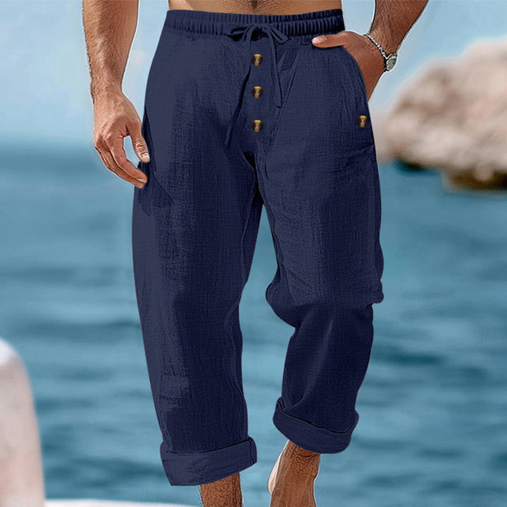 Back view of men's comfortable linen pants, perfect for summer, featuring a relaxed and airy fit.