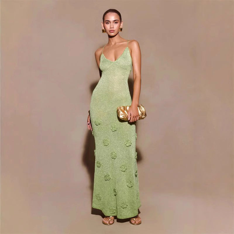 Stunning green women's crochet floral long sleeve evening gown with shimmering sequins for special occasions.