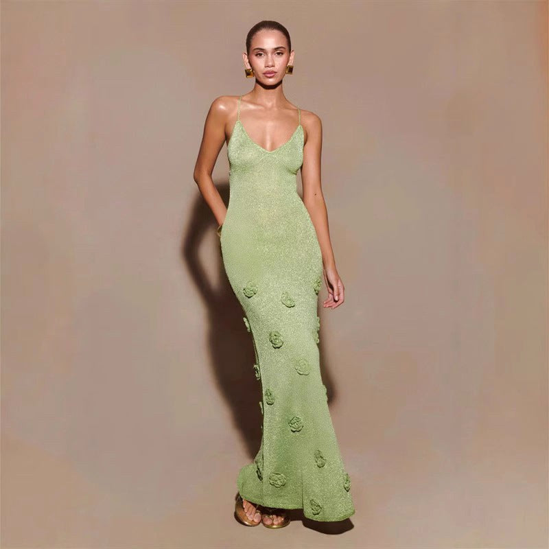 Flattering women's formal crochet floral evening dress featuring sparkling sequin embellishments & long sleeves.