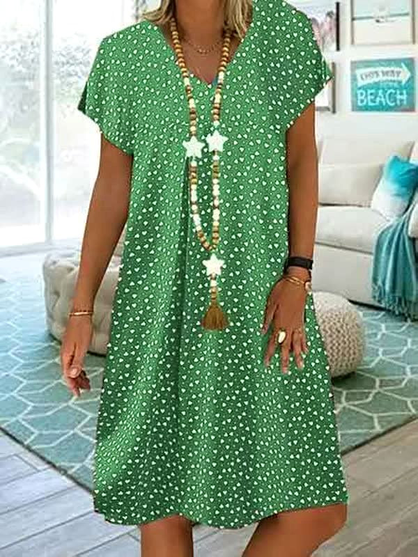 Stylish women's polka dot midi dress, a lightweight and airy design for comfortable, fashionable summer days.