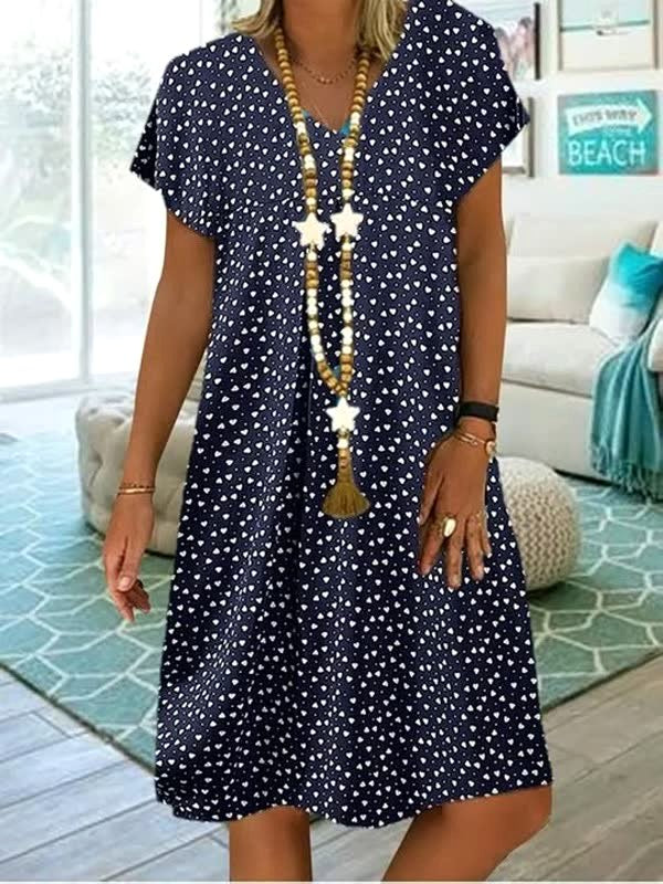 Soft, lightweight women's polka dot midi dress, a comfortable and stylish choice for sunny summer weather.