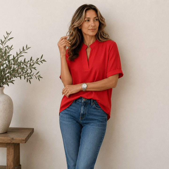 Sophisticated women's V-neck top with short sleeves, great for office & casual style.