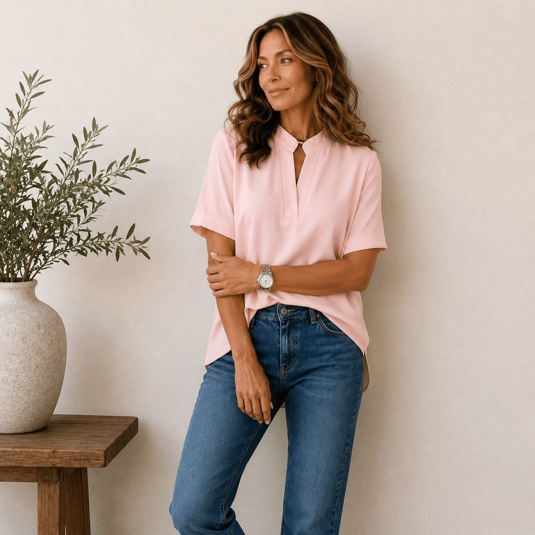 Stylish short-sleeve V-neck top for women, perfect for versatile office and casual wear.