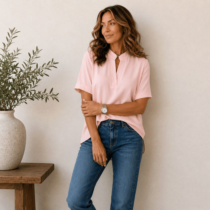 Stylish short-sleeve V-neck top for women, perfect for versatile office and casual wear.