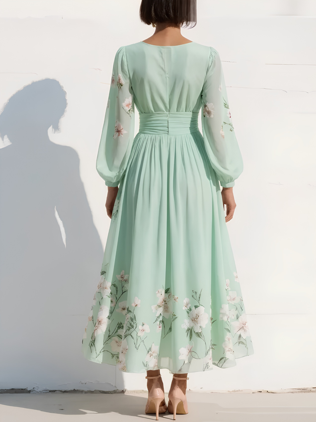 Stylish women's midi floral dress with long sleeves, ideal for race day events, elegant occasions, and parties.