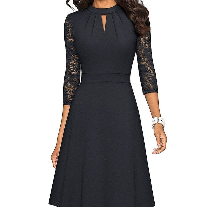 Black A-line women's party dress with elegant sheer sleeves & pleated neckline for cocktail or formal events.
