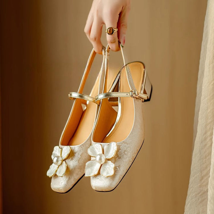 Fashionable women's floral jacquard block-heel pumps. Elegant and comfortable dress shoes.