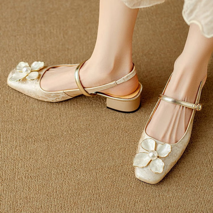 Elegant floral jacquard block-heel pumps for women. Stylish pointed-toe dress shoes.