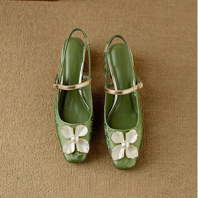 Women's floral jacquard block-heel pumps. Modern elegance meets classic comfort in dress footwear.