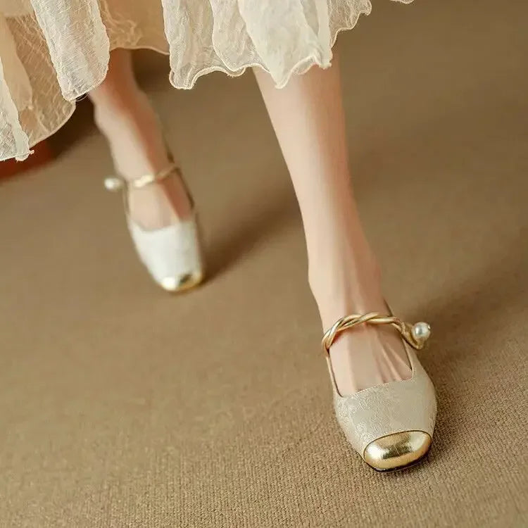 Elegant women's vintage pearl strap Mary Jane shoes, perfect for parties & formal events.
